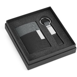 Travolta sada vizitkáře a klíčenky